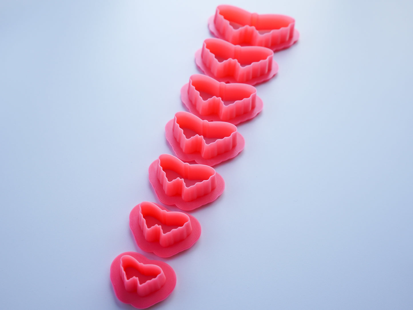 Set of Pink Butterfly Clay Cutter shown in all available sizes.