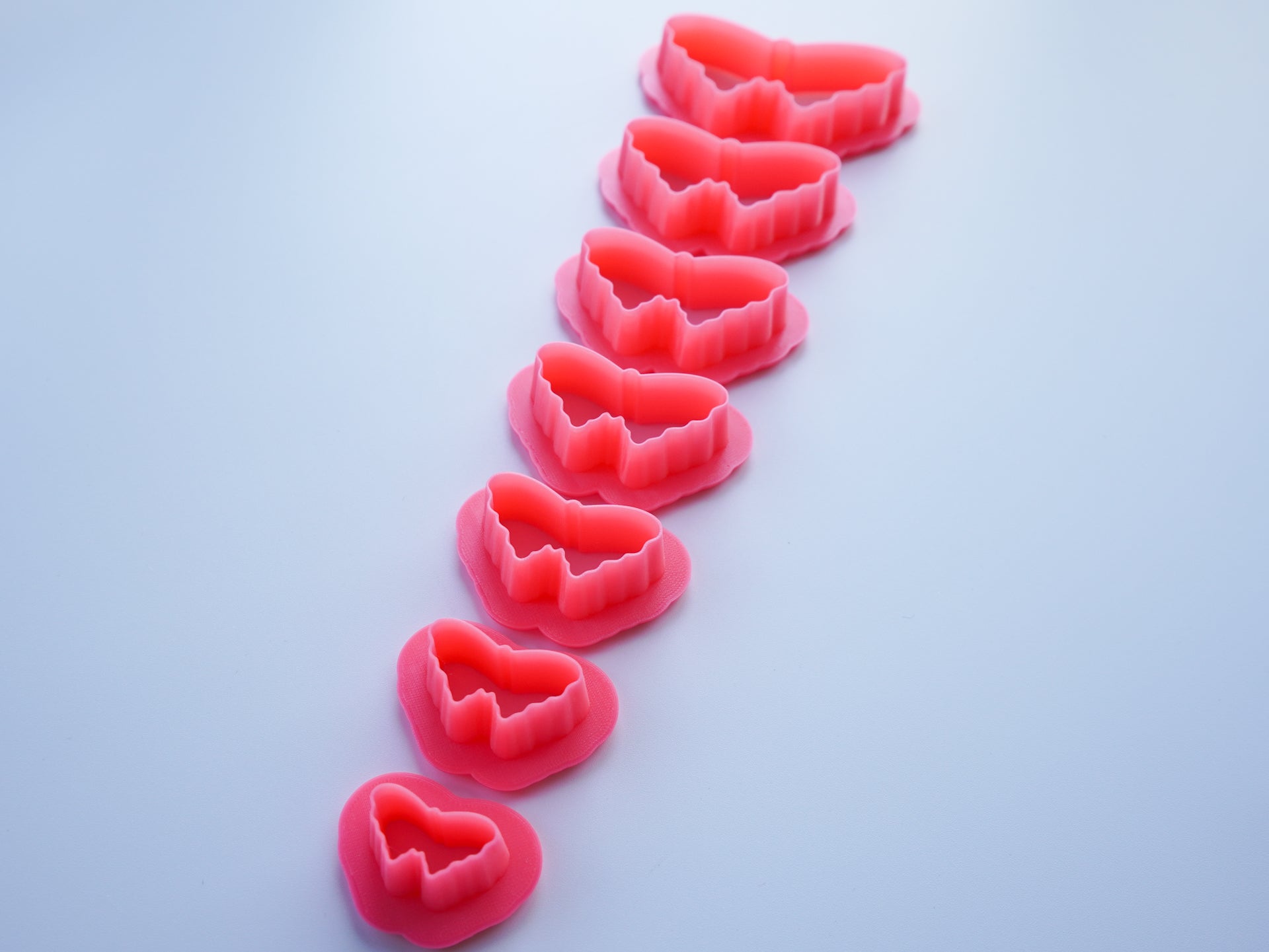 Set of Pink Butterfly Clay Cutter shown in all available sizes.